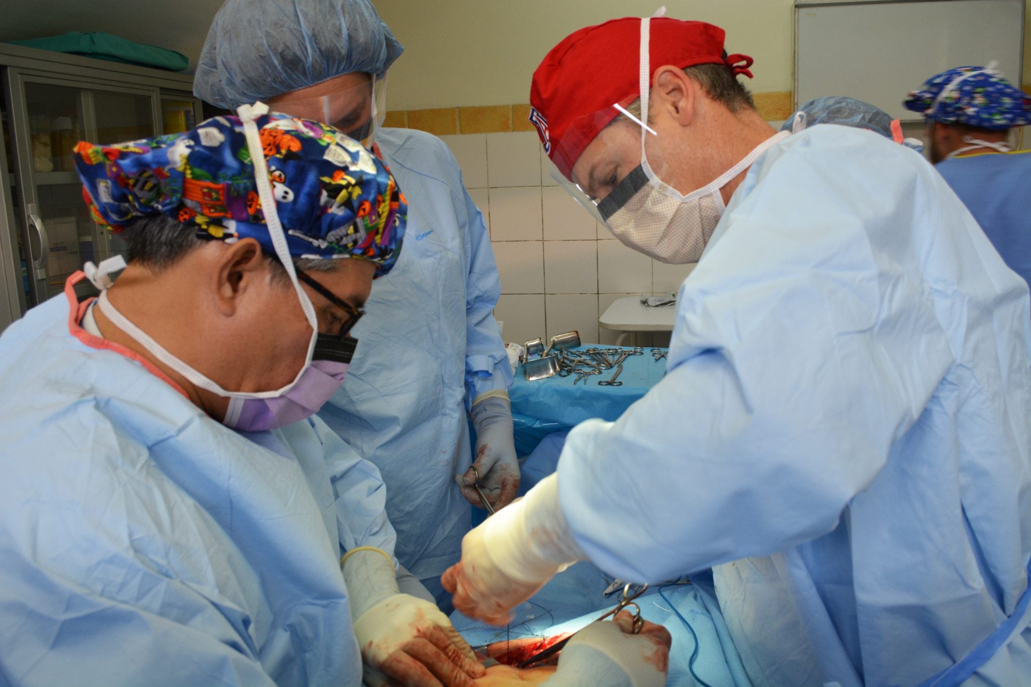 A group of surgeons working on a patient in Bolivia.