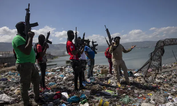 Haiti's armed gangs block fuel, food, and water triggering the collapse of basic services. Photo Credit: Photograph: Rodrigo Abd/AP