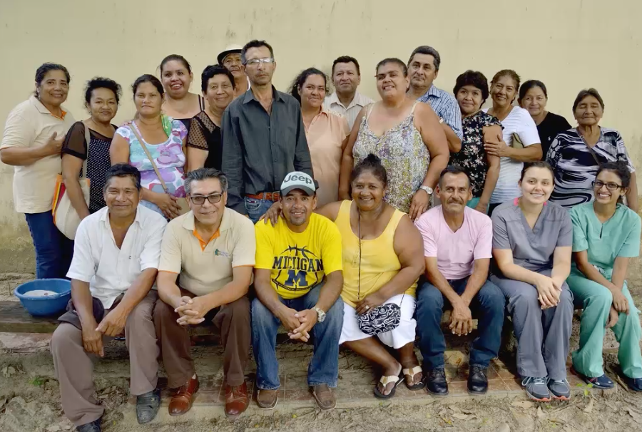 A group of people posing for a photo in Bolivia.